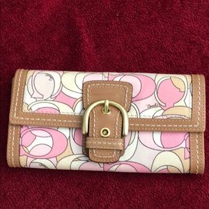 Authentic Coach Pastel Buckle Flap wallet.
